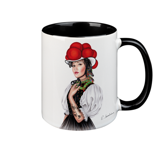 A white ceramic mug with a black handle and black interior features a detailed illustration of a woman wearing a traditional outfit and a red bollenhut hat. The woman has a thoughtful expression, and her attire is decorated with intricate patterns. This microwave-safe mug is also dishwasher safe. The product name is MUG – Bollenhut Black Forest Bonnie, by the brand Cuckoo's Nest.